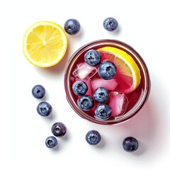 A refreshing blueberry lemonade with fresh blueberries and lemon slices, in a pitcher, isolated white background