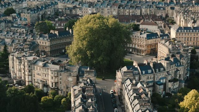 Aerial establishing orbit of Georgian city of Bath, The Circus, Somerset, England