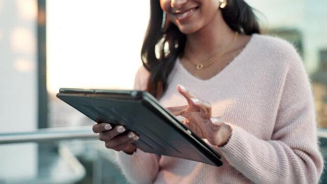 Balcony, hands and businesswoman with tablet for typing, research and online results with smile. Reading, career and Indian editor with digital for scroll article, blog post or information in rooftop