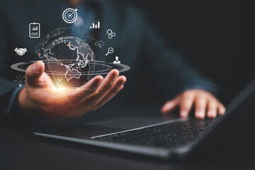 Fototapeta premium Man hand holding virtual global Internet connection metaverse. Business global internet connection application technology and digital marketing, Financial and banking, Digital link tech, big data.