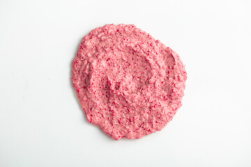 Berry yoghurt ice cream close-up on a white background.. Smoothies from fresh fruits and berries. Ice cream texture. Delicious sweet dessert close-up as a background.
