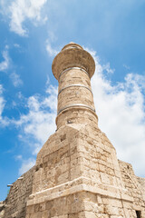 Well  preserved stone minaret from mosque on the embankment of the Caesarea fortress in the north of Israel