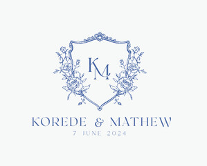 Wedding logo crests vector design royal style blue color illustration monogram crest design with KM initial surrounded by baroque style intricate motifs