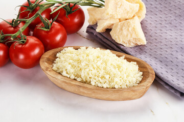 Shredded Italian hard parmesan cheese