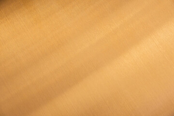 Fototapeta premium Studio style background wall decoration presentation uses white and gold tones. with shadows cast from a nearby window, concept creating a decorative backdrop.