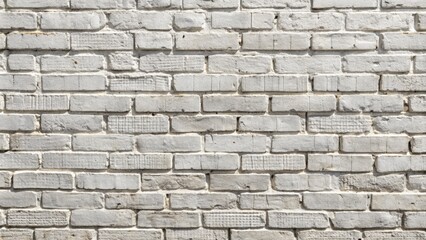 Fototapeta premium Weathered distressed white brick wall with subtle gray undertones, rough uneven texture, and linear cracks in a wide panoramic format.
