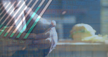 Image of statistics and financial data processing over caucasian man using smartphone