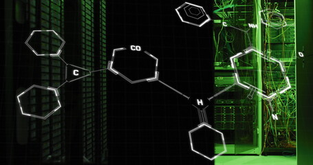 Image of molecule structures over illuminated server room in background