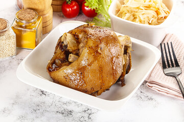 Baked pork knee with spices