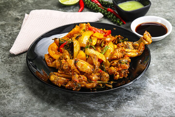 Vietnamese cuisine - fried frog with vegetables