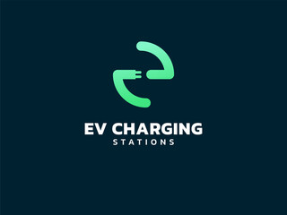 Fototapeta premium Electric vehicle charging letter e with EV Plug Connector Symbol logo vector design concept. Letter E logotype symbol for Electric Car, EV station, ui, web, ev business, infographic, new technology.