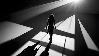 A woman walks in a dress, silhouetted against the sunbeams coming through a large window