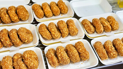 Thai food Shrimp Cakes donut (Tod Mun Goong). Thai Cuisine. Thai crispy breaded shrimp, Deep fried shrimp cakes. Thai street food easy to eat, Tasty and crispy snack at Thai street market.