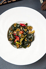 Spicy,sesame,oil,sauce,with,cucumbers