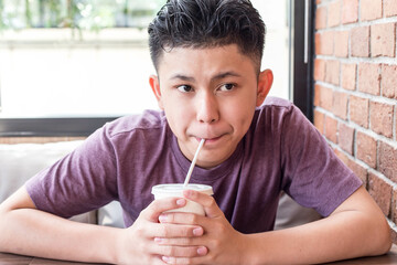 man drinking a glass of milk