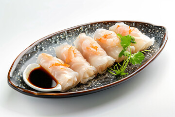 a plate of shrimp and sauce with a small bowl of sauce