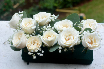 bunch of white roses on the table