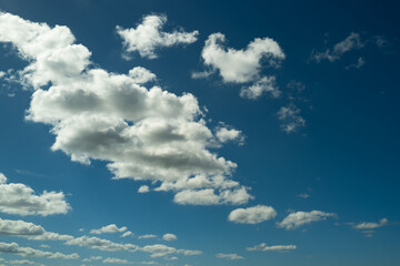 Calm heaven clouds, summer season outdoor. Cloudy sky. Vivid cyan blue sky with clouds in environment day horizon skyline view. White clouds on soft sky background. White cloudy sky.