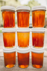 Fresh honey jars stacked ready for market