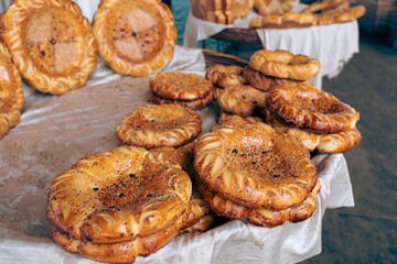 A table full of different types of bread