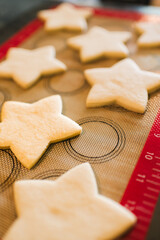 star shaped sugar cookies on a baking sheet