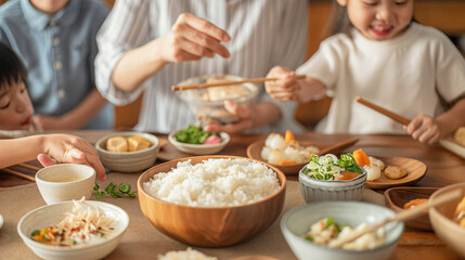 A family is sitting down to eat a meal together