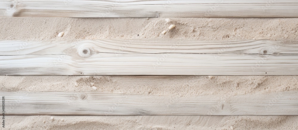 Poster white planked wood covered in sand, serving as a summer background for a flat lay photo with a top v