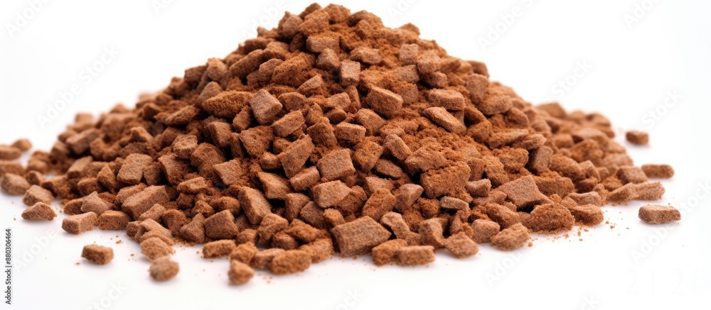 Poster isolated stack of dry spiced brown pet food with large granules, with copy space image.