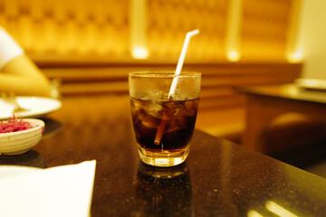 Close up glass cup of iced Cola drinks