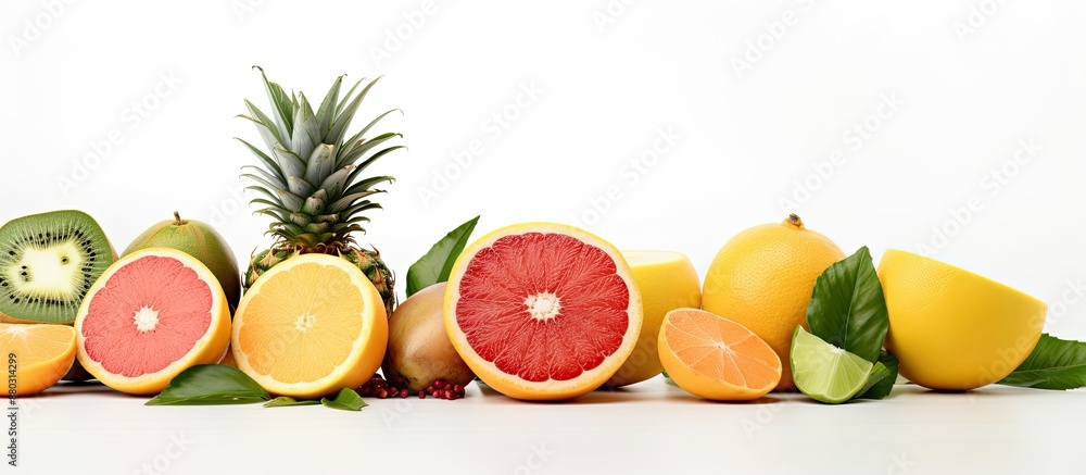 Aufkleber a close-up image with exotic sliced pineapple, lime pieces, halved grapefruit, and passionfruit on a