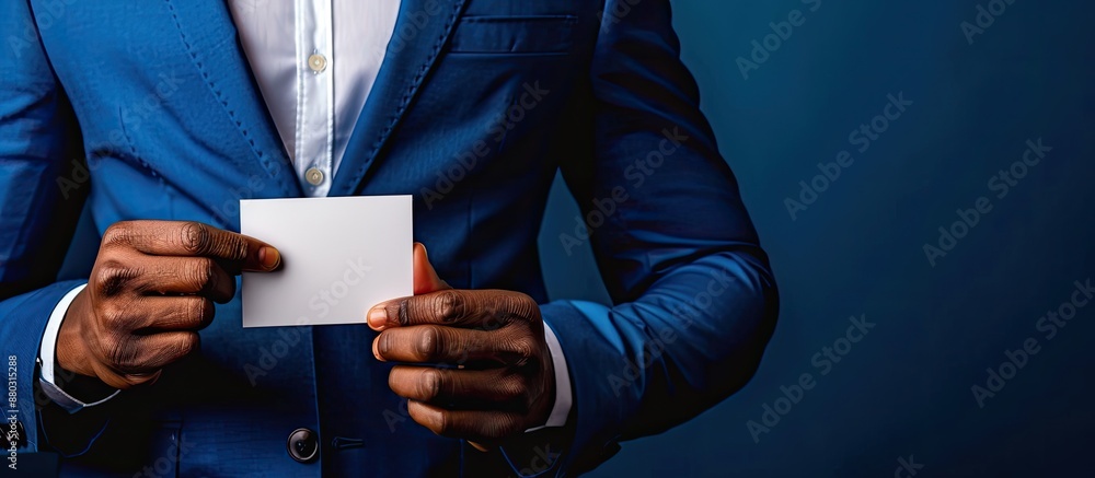 Poster man in blue attire displays his business card with a blank space for text or images.