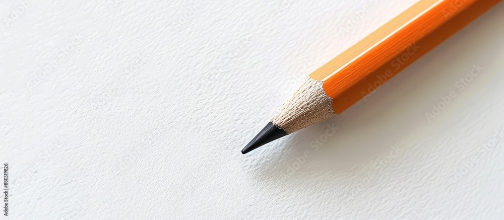 Poster A pencil displayed on a white background with room for additional image or text.