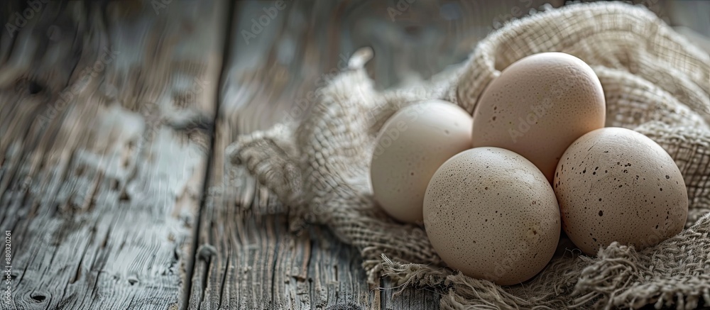 Aufkleber Three eggs displayed on a rustic wooden table with copy space image.