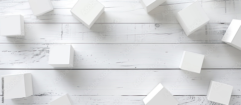 Aufkleber Flat lay of blank cubes on a light grey wooden table with a free area for text Includes a copy space image