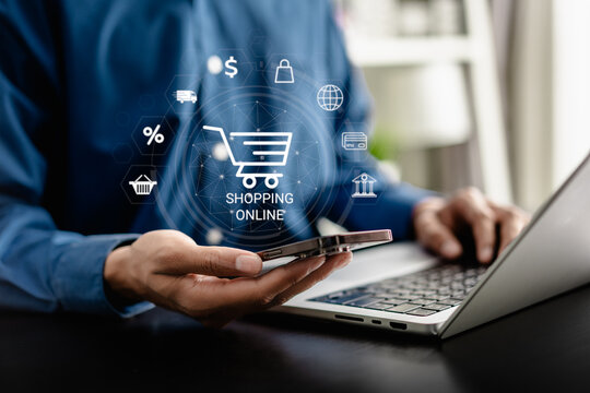 Businesswomen use smartphone connect icon virtual shopping online with cart icons with a virtual interface shipping global network connection, online shopping, and e-commerce concept.