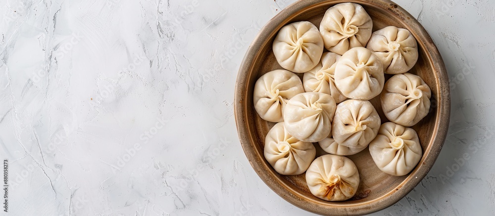 Poster top view image of khinkali displayed on a white background with ample copy space