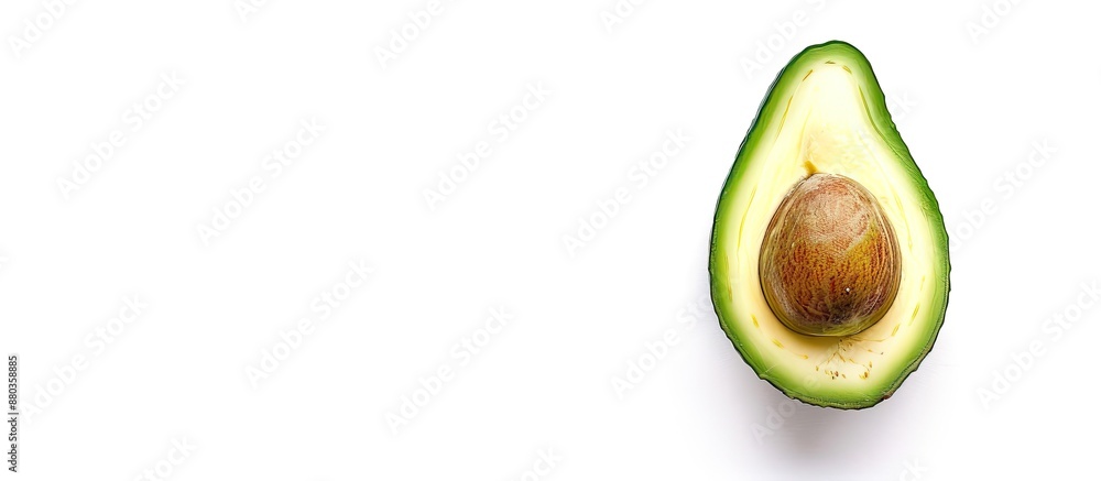 Poster half of a fresh ripe organic avocado on a white background with space for text or other images. copy