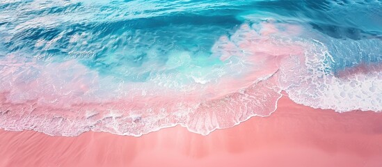 Fototapeta premium Australian coastal view with a serene beach showing a vast seascape in blue and pink hues with low tides gently washing onto the shore depicting a peaceful atmosphere Copy space image
