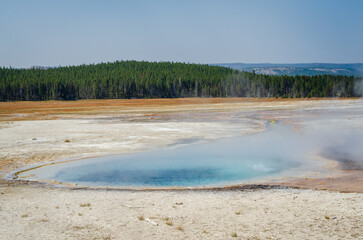 White silica-rich sinter on the Ground by the Hydrothermal Waters at Yellowstone National Park at Midway Geyser Basin