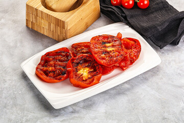 Griiled ripe red tomatoes snack