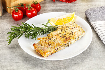 Baked salmon fish served rosemary