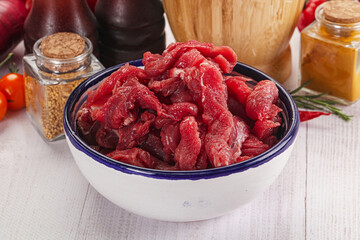 Raw beef meat - sliced strips