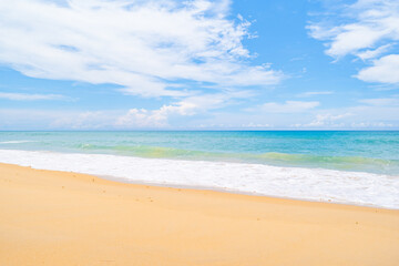 Fototapeta premium Beach in summer season at Phuket Thailand. Concept Travel and tour background,Empty beach copy space with waves crashing on sand