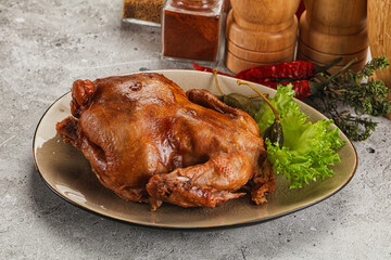 Baked small chicken with spices