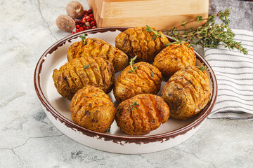 Baked baby potato with thyme