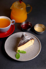 Table scene of assorted take out or delivery foods. Hamburgers, pizza, fried chicken and sides. Top down view on a dark wood banner background.