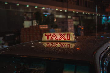taxi sign at night