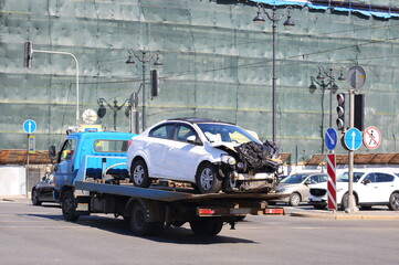Evacuation of a broken car after an accident on a city street, Dvortsovaya Embankment, St....