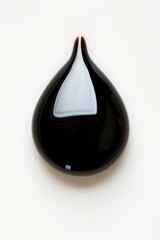 Obraz premium Stylized black drop on white, concept of purity and fuel