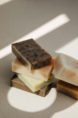 Handmade soap from natural ingredients, various herbs. Concept of sustainable use, bath products. Top view